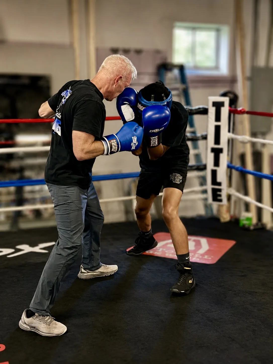 Close ring work with the coach at Saint Michaels Boxing Club