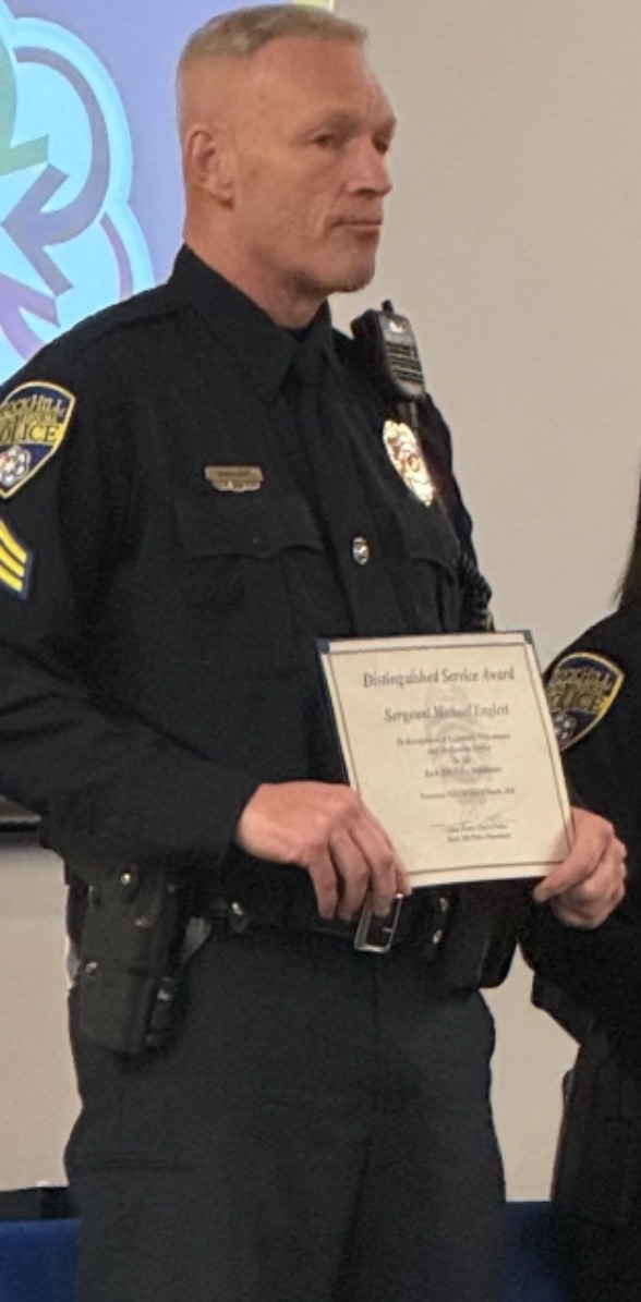 Michael J. Englert in Rock Hill Police Department uniform receiving the Distinguished Service Award