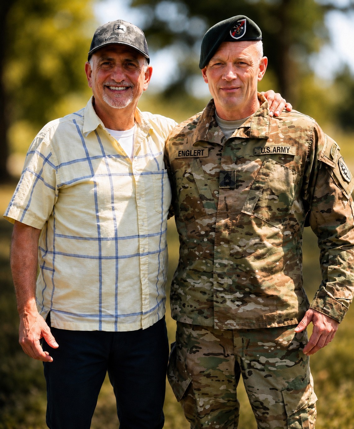 Michael J. Englert, right, in U.S. Army uniform wearing the Special Forces green beret